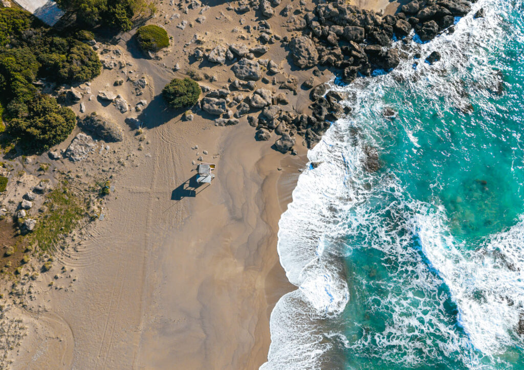 Falassarna Beach in western Crete with turquoise sea, sandy shore, and calm summer atmosphere.